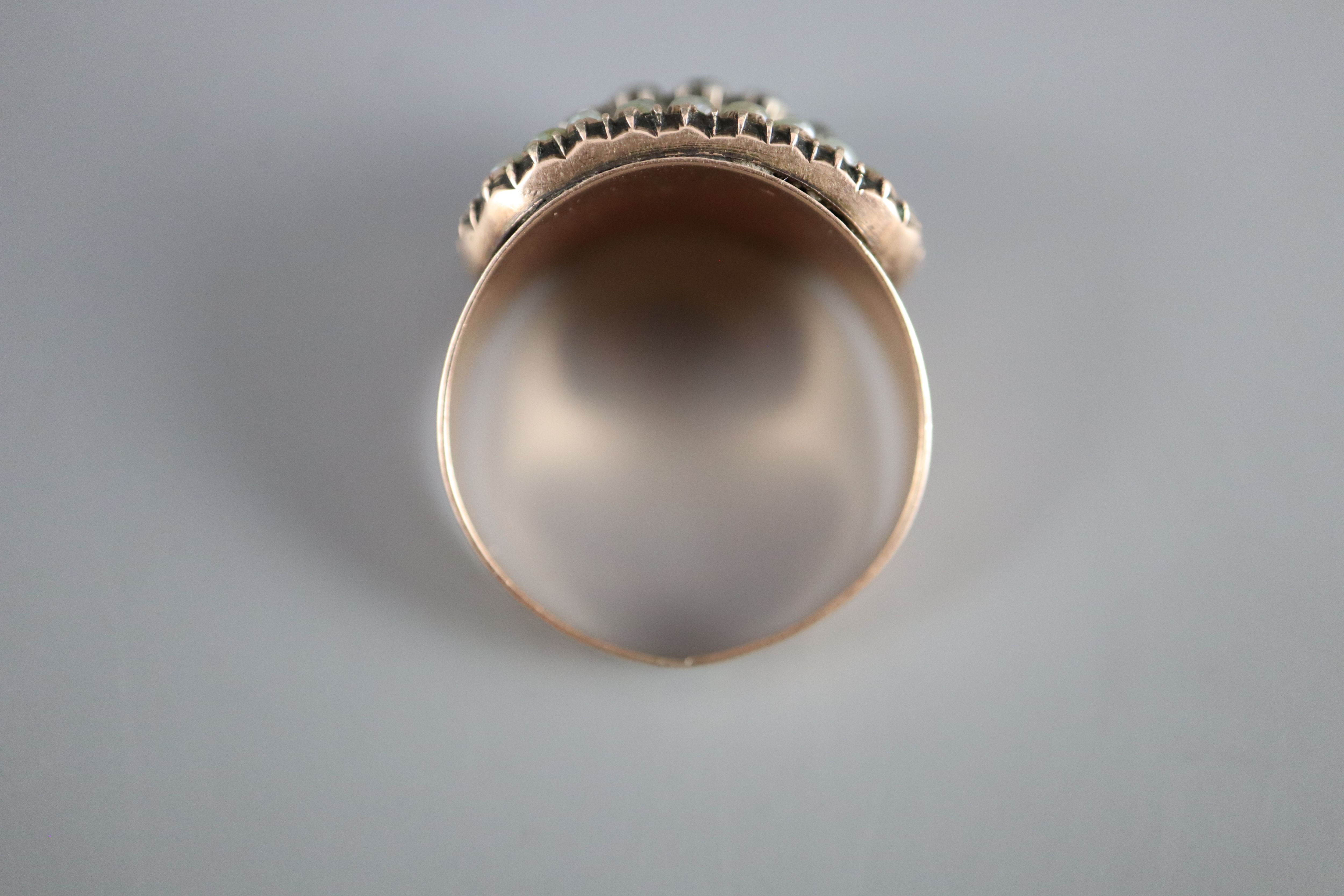 A Georgian gold, enamel, split pearl and gem set cluster ring,